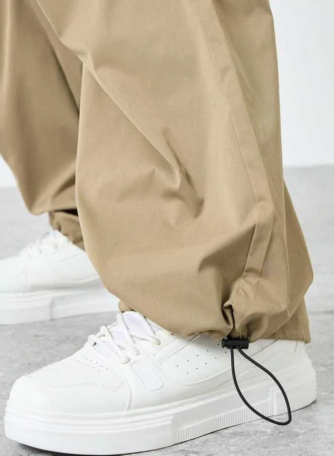 Styli Styli Woven Oversized Fit Open Hem Joggers with Adjustable Loop