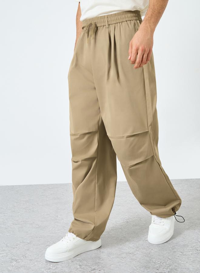 ستايلي بنطلون رياضي واسع بخصر قابل للتعديل وحافة مفتوحة - Image 1