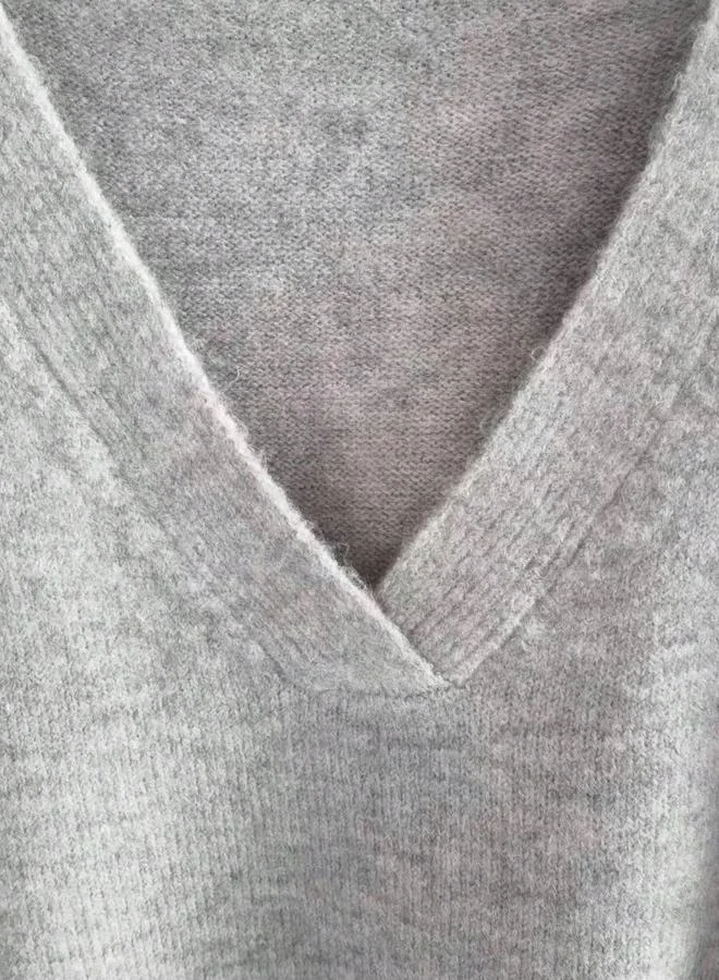 تايك تو كنزة محبوكة بمقاس كبير