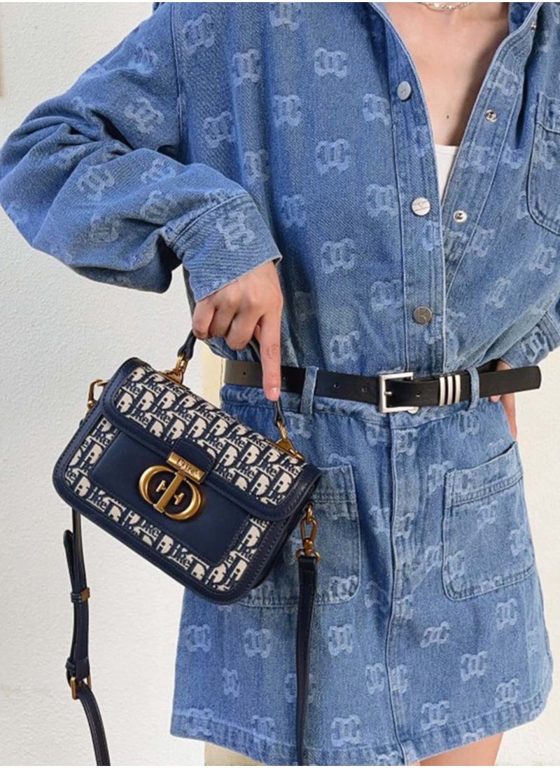 DJRE - DJRE women's hand bag in blue with a distinctive shape and a long and elegant strap - Image 1