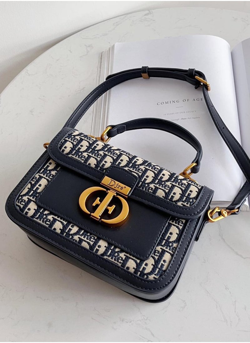 DJRE - DJRE women's hand bag in blue with a distinctive shape and a long and elegant strap - Image 1