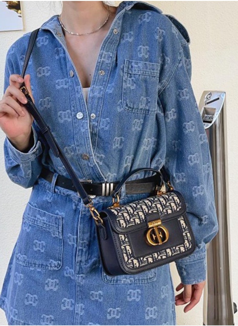 DJRE - DJRE women's hand bag in blue with a distinctive shape and a long and elegant strap - Image 1