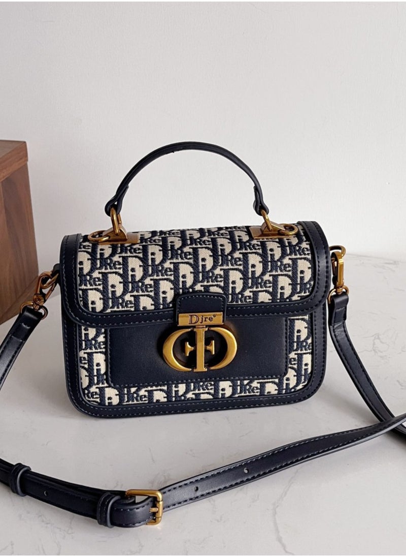 DJRE - DJRE women's hand bag in blue with a distinctive shape and a long and elegant strap - Image 1
