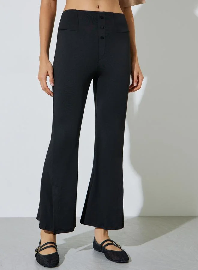 ستايلي Black Solid Flared Pants with Button Detail