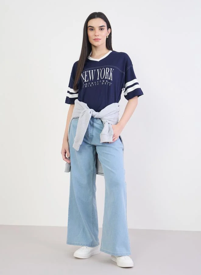 ستايلي تيشيرت واسع بطبعة جرافيك وأكمام قصيرة