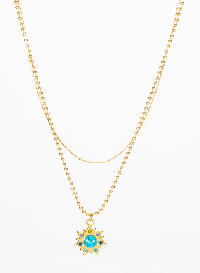 ذا بلاك بيرل اكسسوريز سلسلة أستانليس ستيل ذهبي 2 دور مع دلاية شكل شمس مرصعة بفصوص الزيركون وحجر فيروزي - Image 2