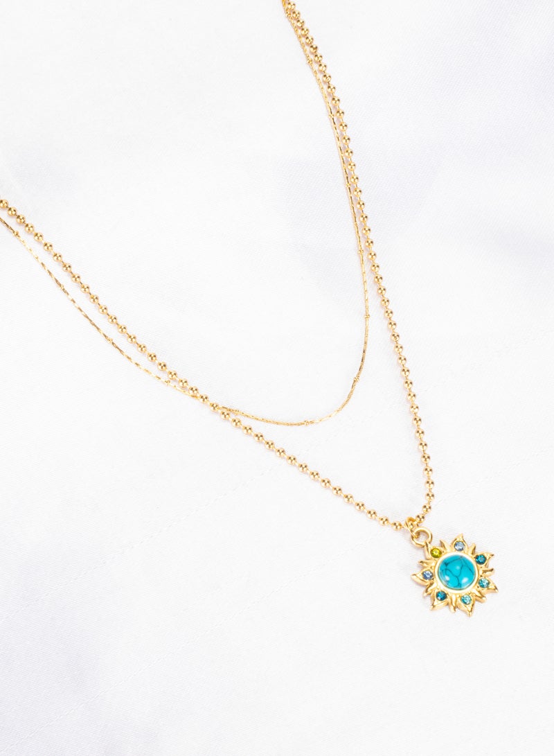 ذا بلاك بيرل اكسسوريز سلسلة أستانليس ستيل ذهبي 2 دور مع دلاية شكل شمس مرصعة بفصوص الزيركون وحجر فيروزي - Image 3