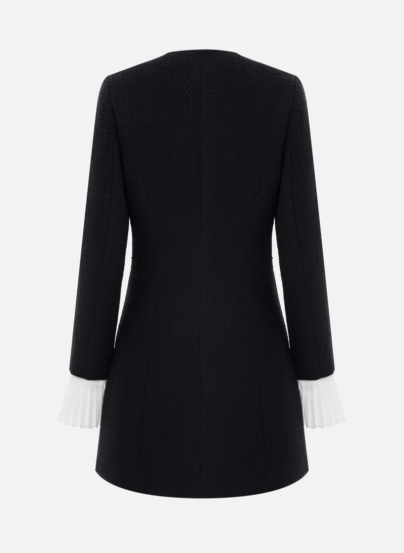 Lichi Tweed mini dress with pleated cuffs and large buttons