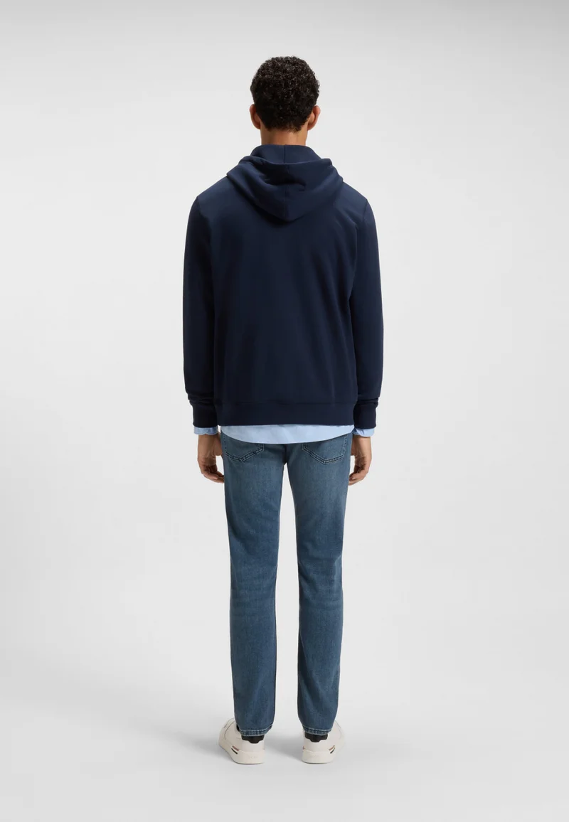 بوس جينز ديلاوير أزرق بقصة ضيقة من دينم مريح قابل للتمدد