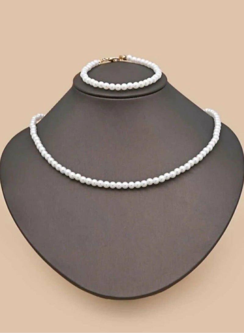 اكسوارات ار ايه طقم نسائي شيك جدا مكون من عقد و اسورةمن اللؤلؤ الاوف وايت  - Image 1