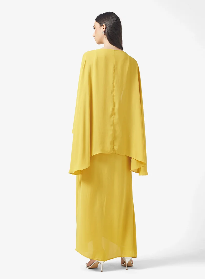 PRETTY LAVISH Ellison Cape Knot Maxi Dress