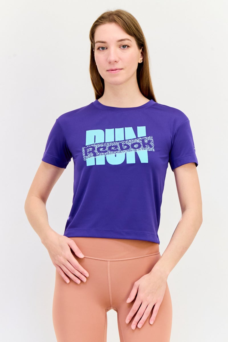Reebok تي شيرت رياضي نسائي قصير الأكمام للجري، بنفسجي - Image 1