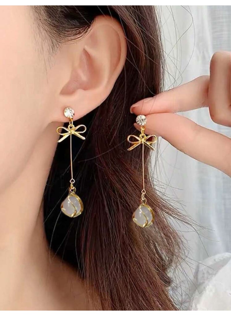 دانجل تشارمز حلق اذن نسائي عصري وأنيق مطلي باللون الذهبي - Image 1