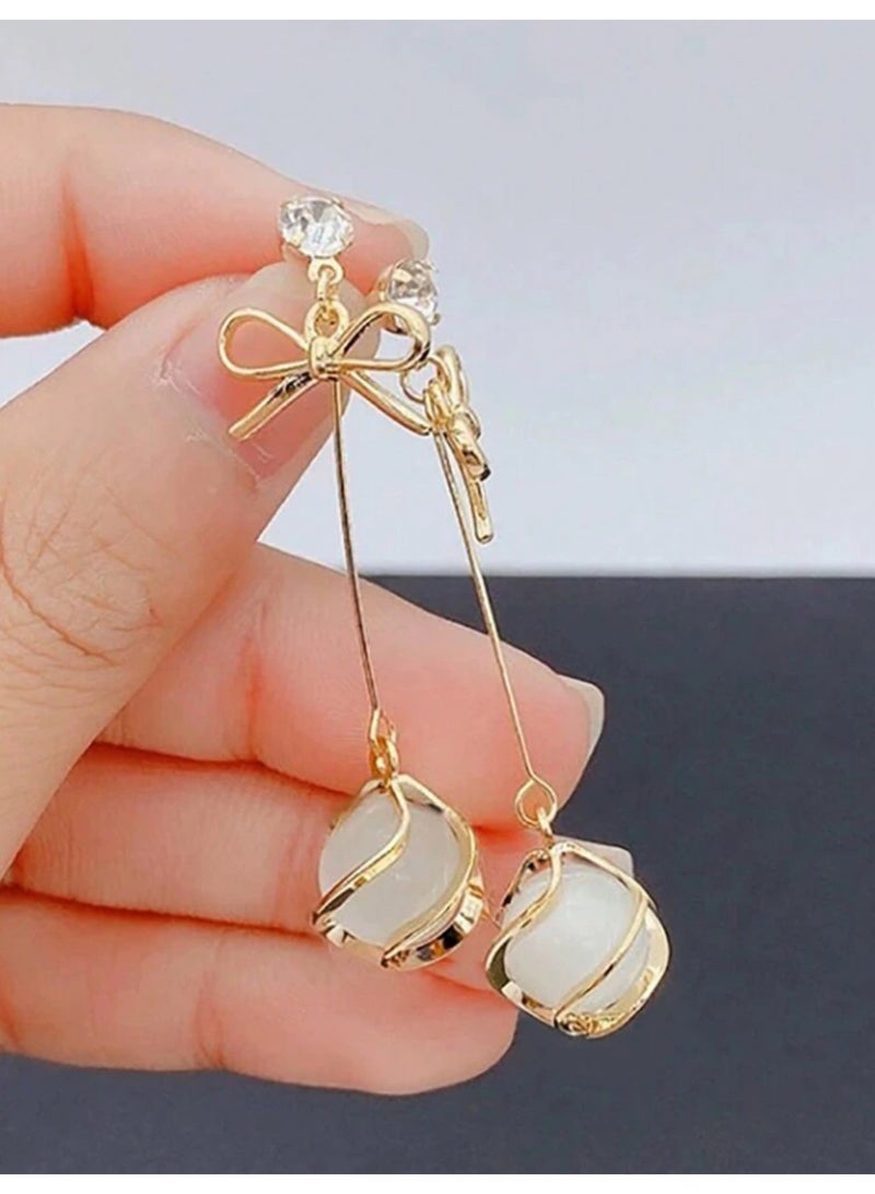 دانجل تشارمز حلق اذن نسائي عصري وأنيق مطلي باللون الذهبي - Image 3