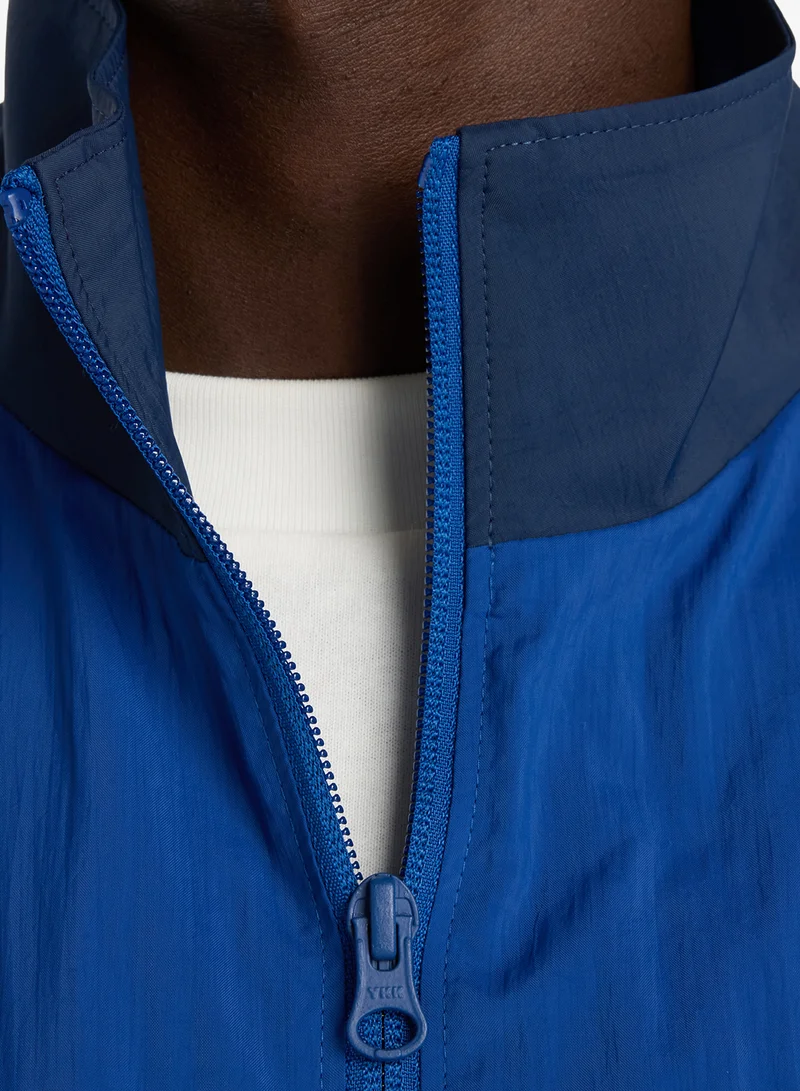 New Balance  Legacy Woven Jacket for Men | Best Price UAE