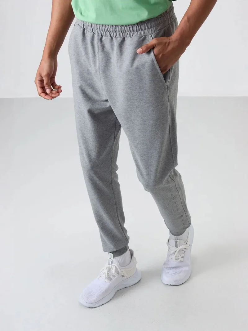 تومي لايف TOMMY Men's Regular Fit Cotton Blend Sweatpants