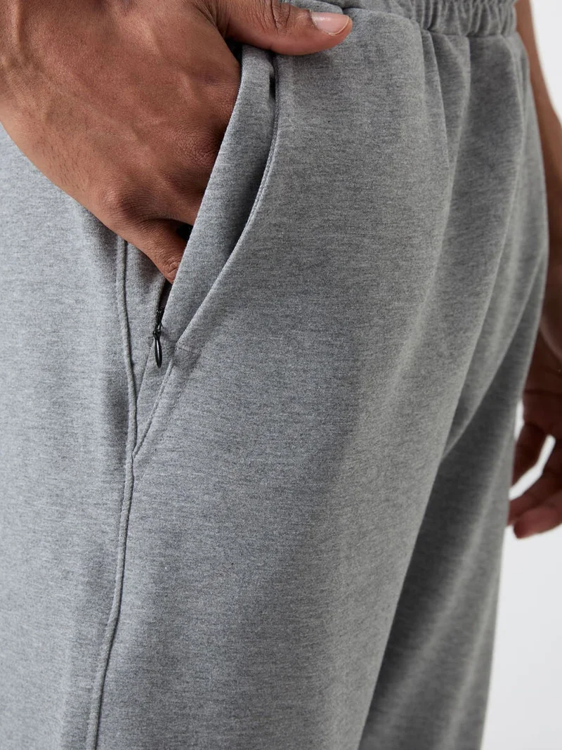 تومي لايف TOMMY Men's Regular Fit Cotton Blend Sweatpants