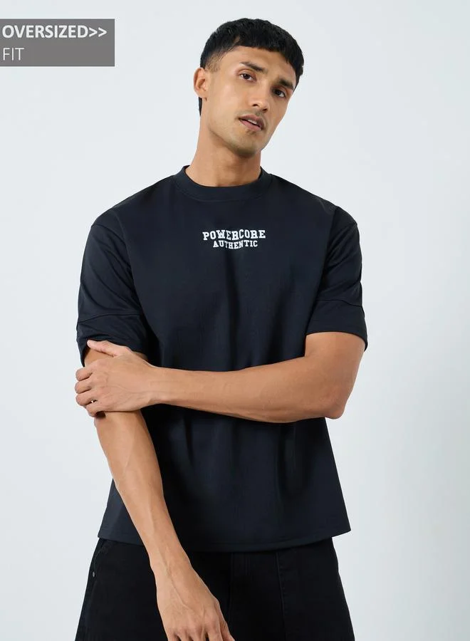 ستايلي تيشيرت واسع بطبعة كتابة