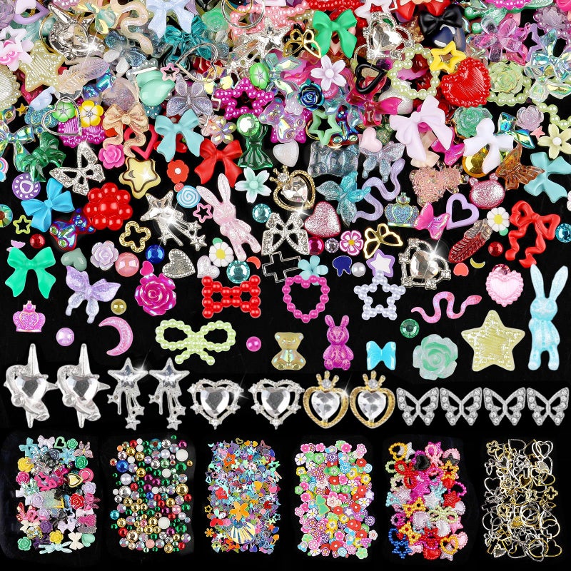 editTime 650pcs Mixed 3D Nail Charms Kit, 12pcs Luxury Metal Nail Rhinestones and 250pcs Resin Butterfly Flower Star Heart Bow Charms with 400pcs Flatback Pearls Rhinestone Metal Gems Charms (Mixed Color) - Image 1