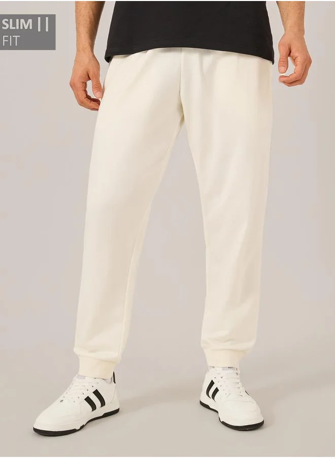 ستايلي Styli Eco-Earth Slim Fit Terry Joggers with Welt Pockets