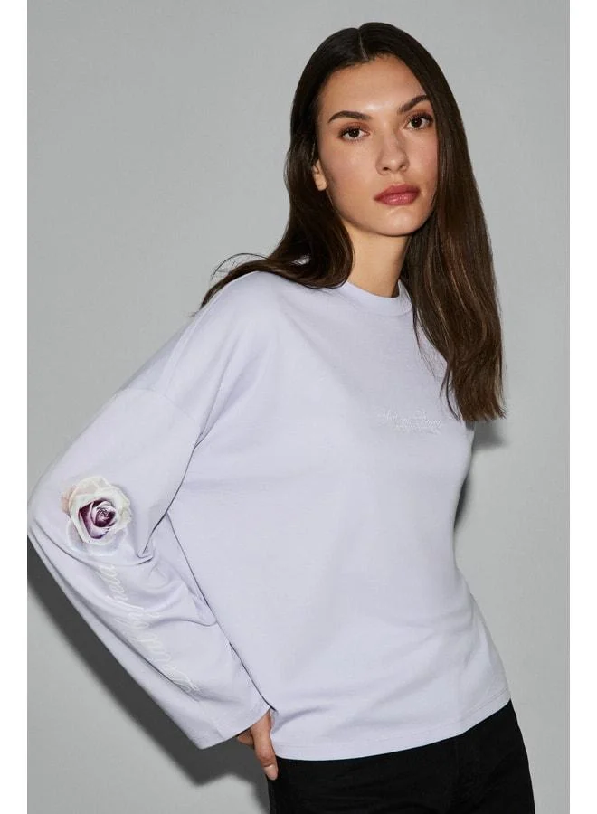 Grimelange CIANELLE Women's Organic Cotton Bike Collar Long Sleeve Oversized Lilac T-Shirt.