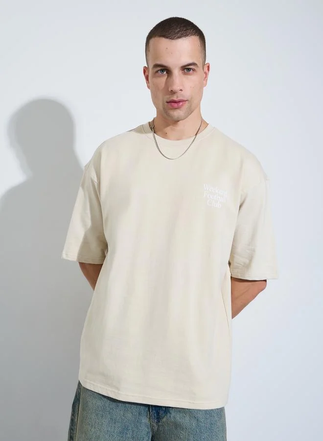 Styli Men Cream Graphic Print Oversized T-Shirt