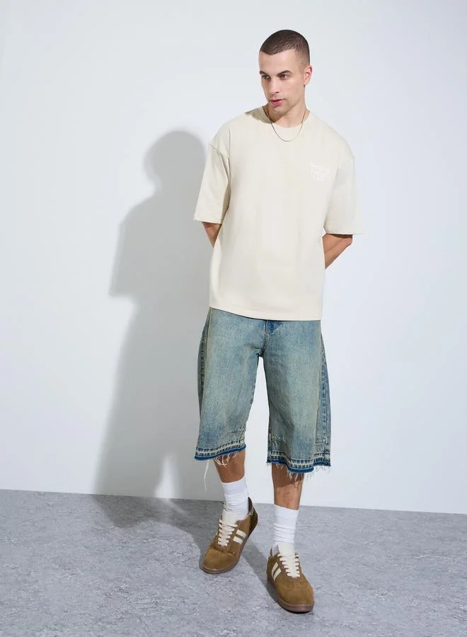 Styli Men Cream Graphic Print Oversized T-Shirt