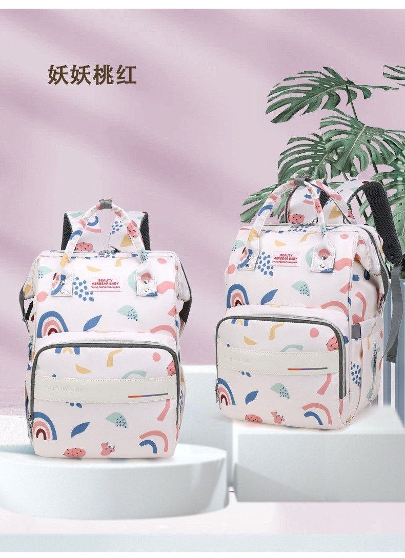 Stylish Multi-Function Baby Diaper Backpack with Modern Abstract Pattern and Spacious Storage