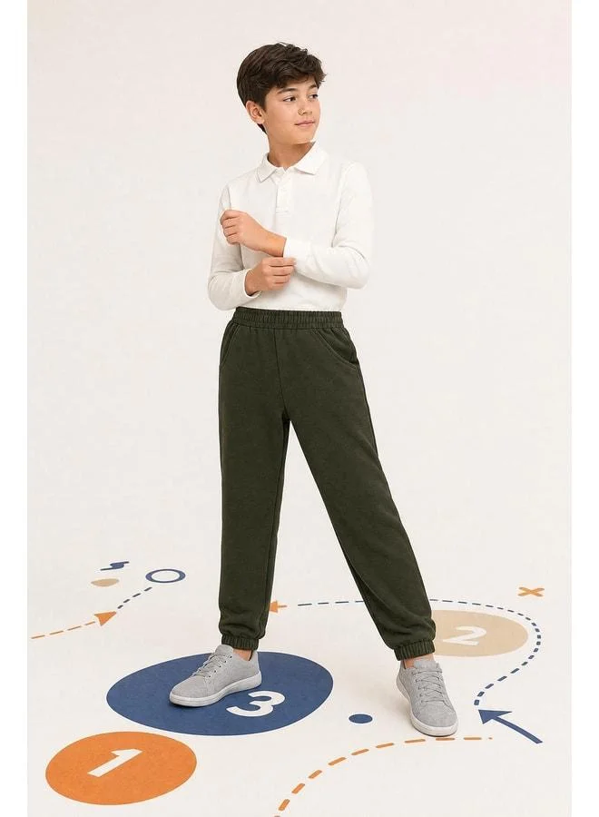 Perendi Elastic Comfortable Fit Pocket Unisex Tracksuit Pants for Boys and Girls.