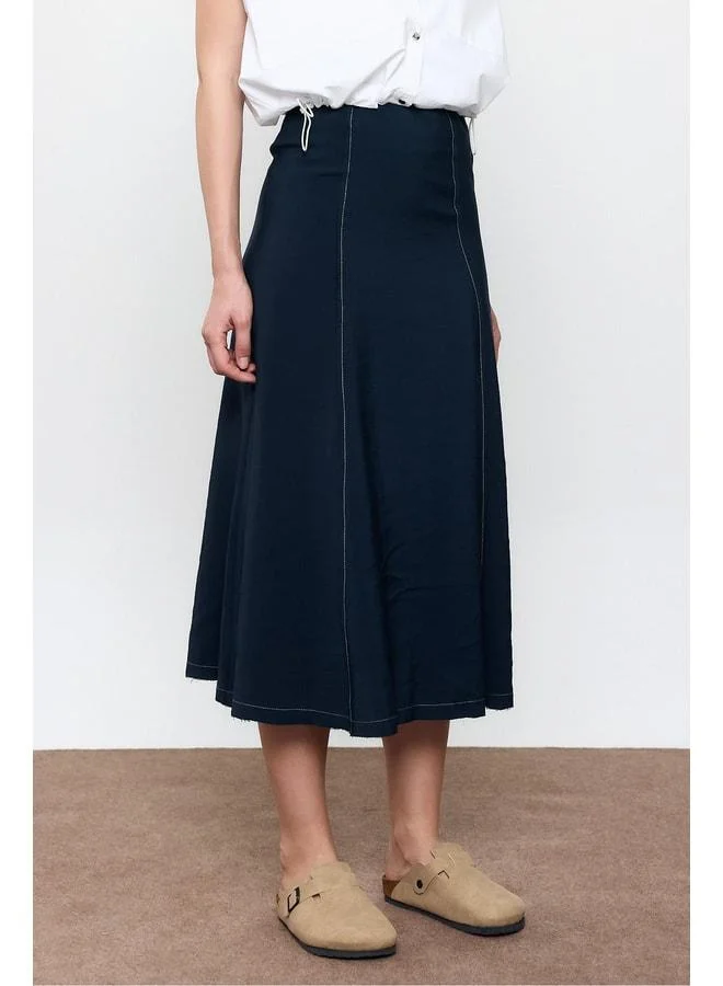 Sherin Navy Stitch-Detail Midi Skirt.