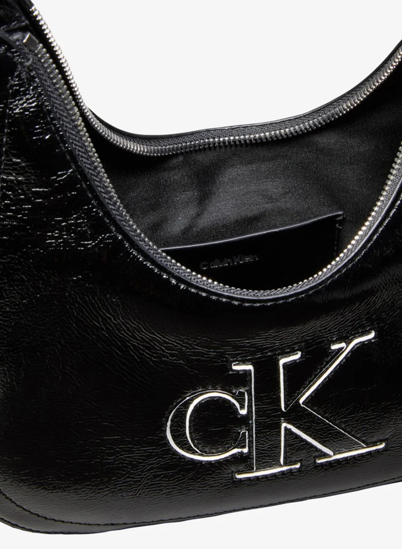 Calvin Klein  Textured Monogram Outline Slouch Bag for Women | Best Price UAE