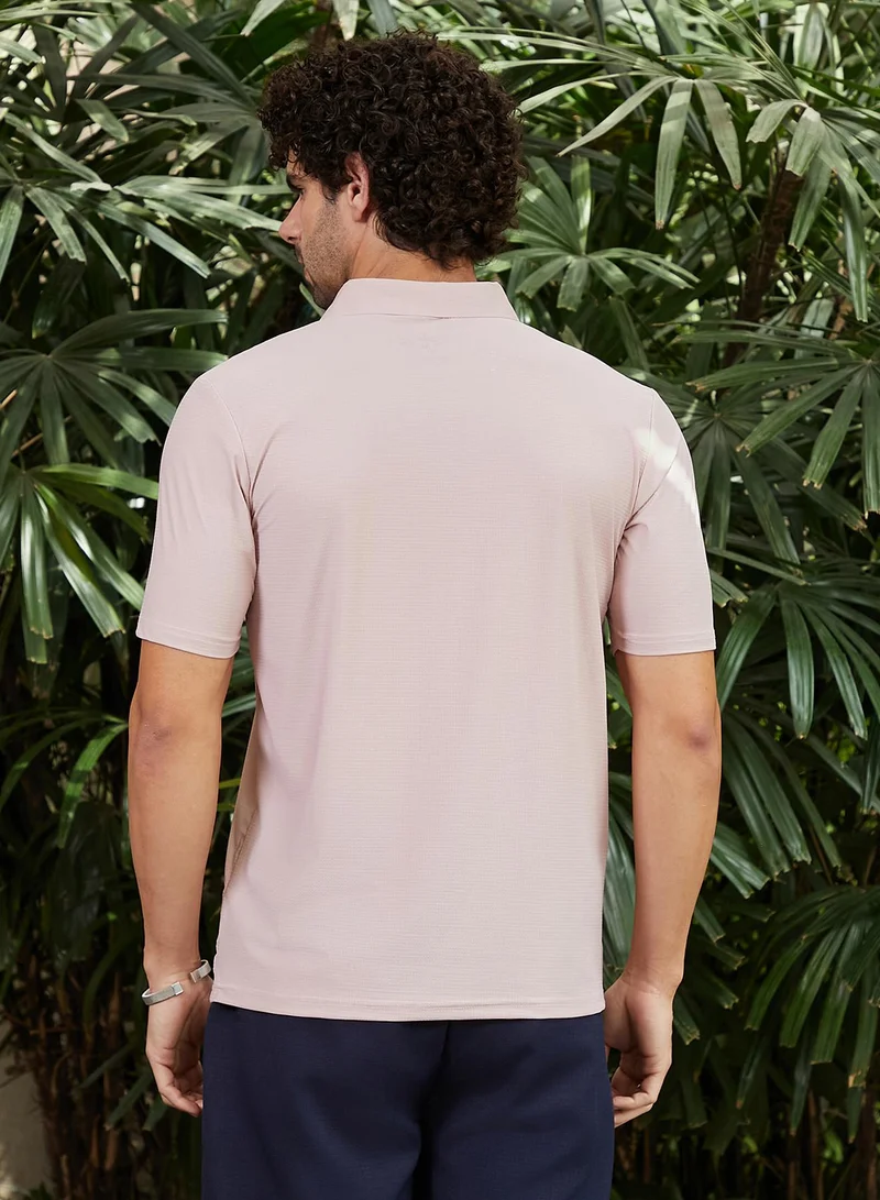 Campus Sutra Men's Baby Pink Seamless Waffle Polo T-Shirt
