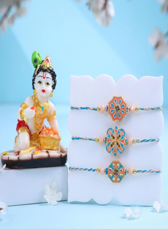 FlowerAura Raksha Bandhan Celebration Premium Tradational Set Of 3 Beautifully Crafted Floral & Geometric Rakhi With Lord Krishna Idol Showpiece- Rakhi For Brother, Bhai, Cousins & Raksha Bandhan Gift - Image 1