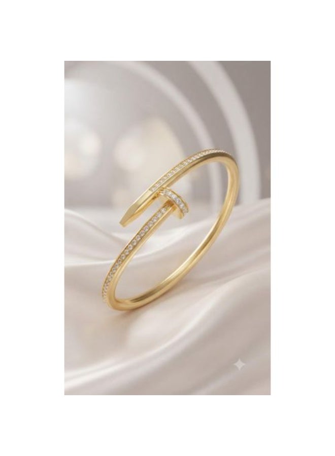Stainless Steel Nail-Inspired Bangle Bracelet with Gold Finish and Pavé Crystal Accents