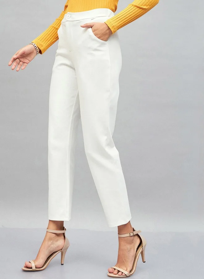 ساسافراس بنطلون نسائي أبيض بقصة مستدقة