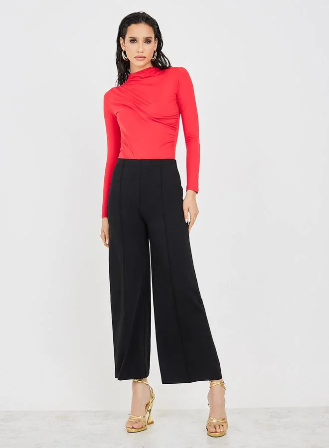 ستايلي High Neck Fitted Bodysuit with Pleats