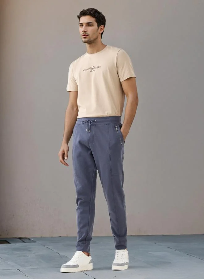 ايكونيك تيشيرت بيكيه بطبعة شعار أيقوني