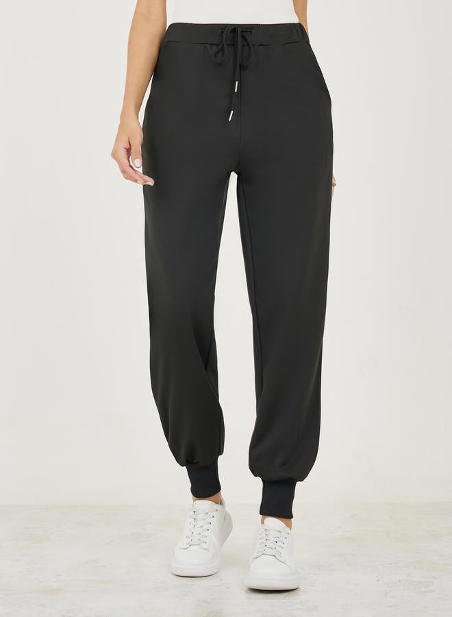 Styli Cuffed Tapered Ankle Length Joggers with Drawstring  - Image 1