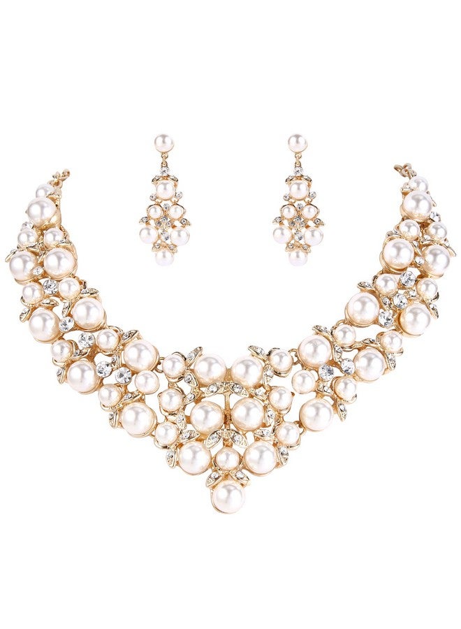 BriLove طقم مجوهرات قلادة أقراط لؤلؤة محاكية للعروس للنساء قلادة بيان مجموعة كريستال وأقراط معلقة لون ذهبي واضح - Image 1