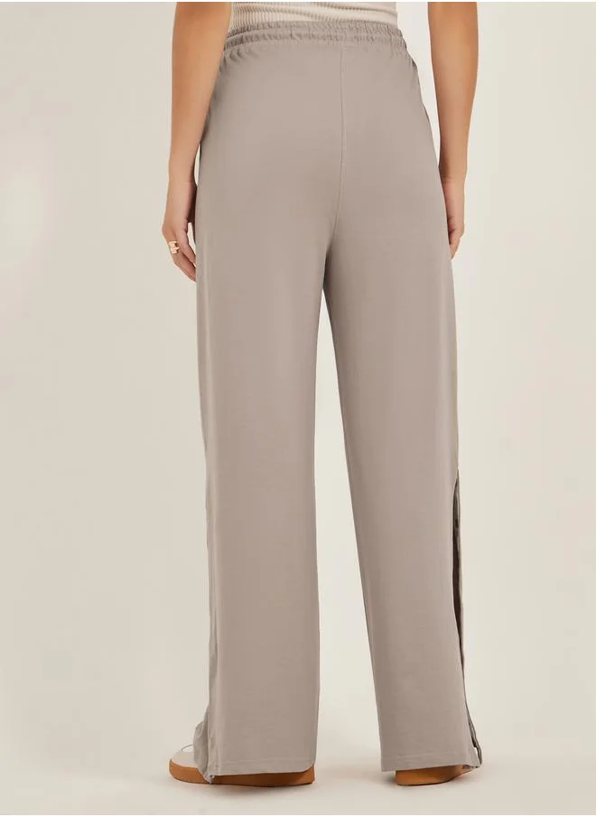 Styli Solid Side Snap Button Hem Joggers