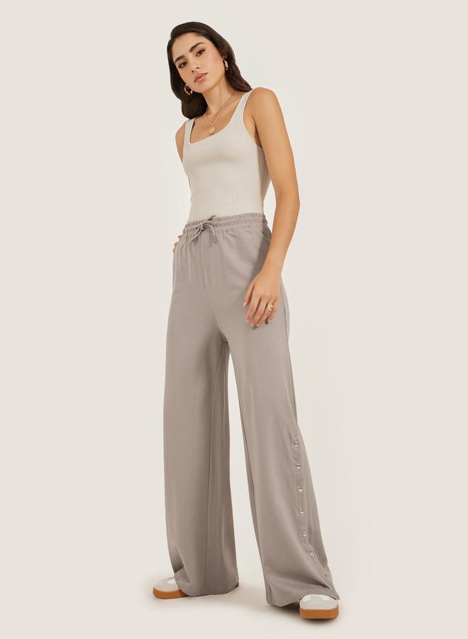 Styli Solid Side Snap Button Hem Joggers - Image 1