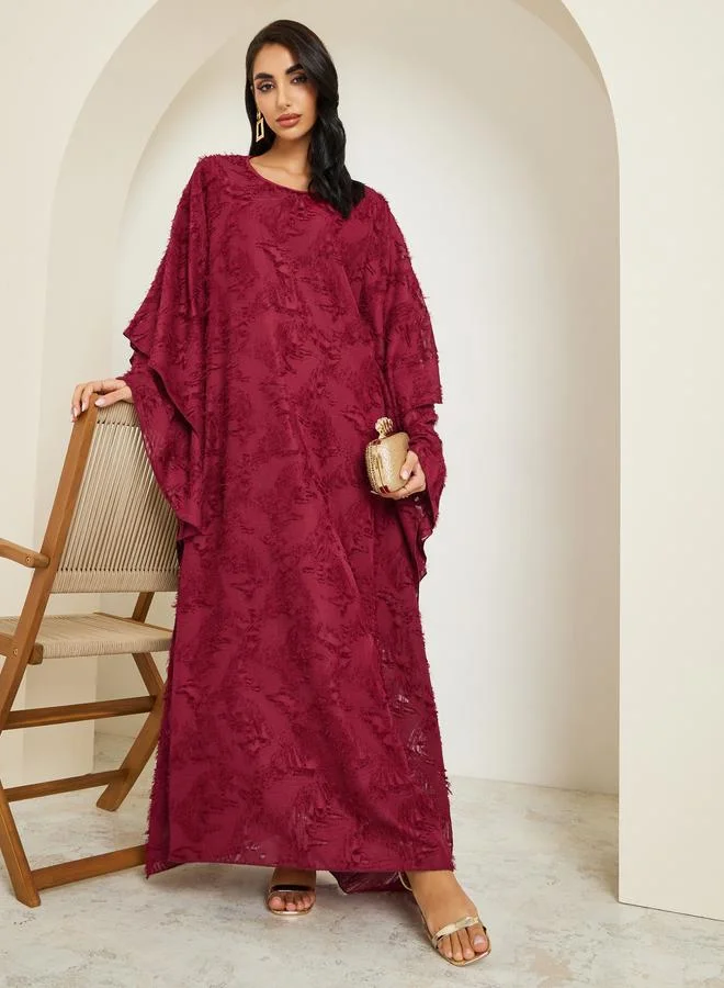 أميرة قفطان طويل بقماش بارز