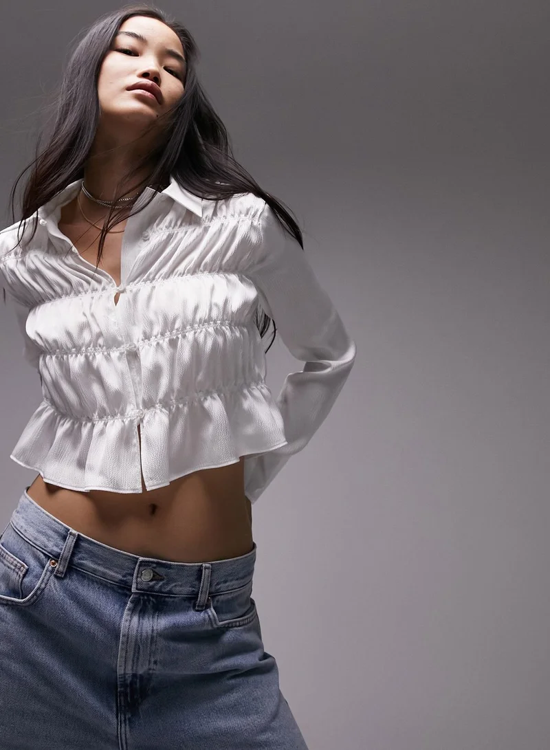 توب شوب قميص بأزرار من أعلى إلى أسفل