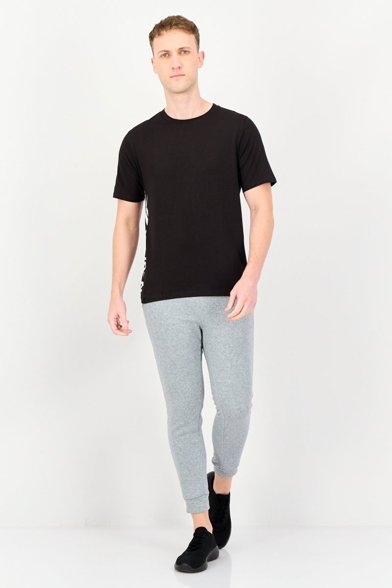 Reebok تي شيرت رياضي للرجال بأكمام قصيرة مناسب في الهواء الطلق، أسود - Image 4