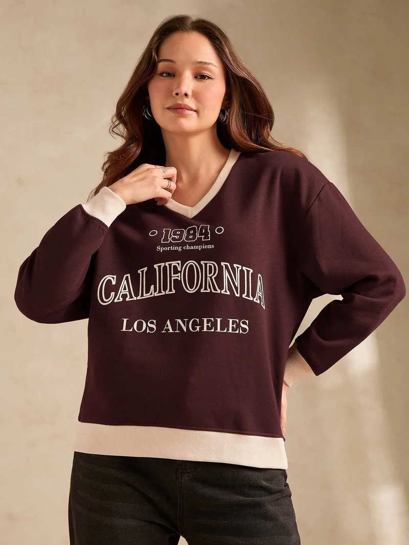 Outzidr  Brown Contrast Neck Graphic Russian Fleece Pullover for Women | Best Price UAE