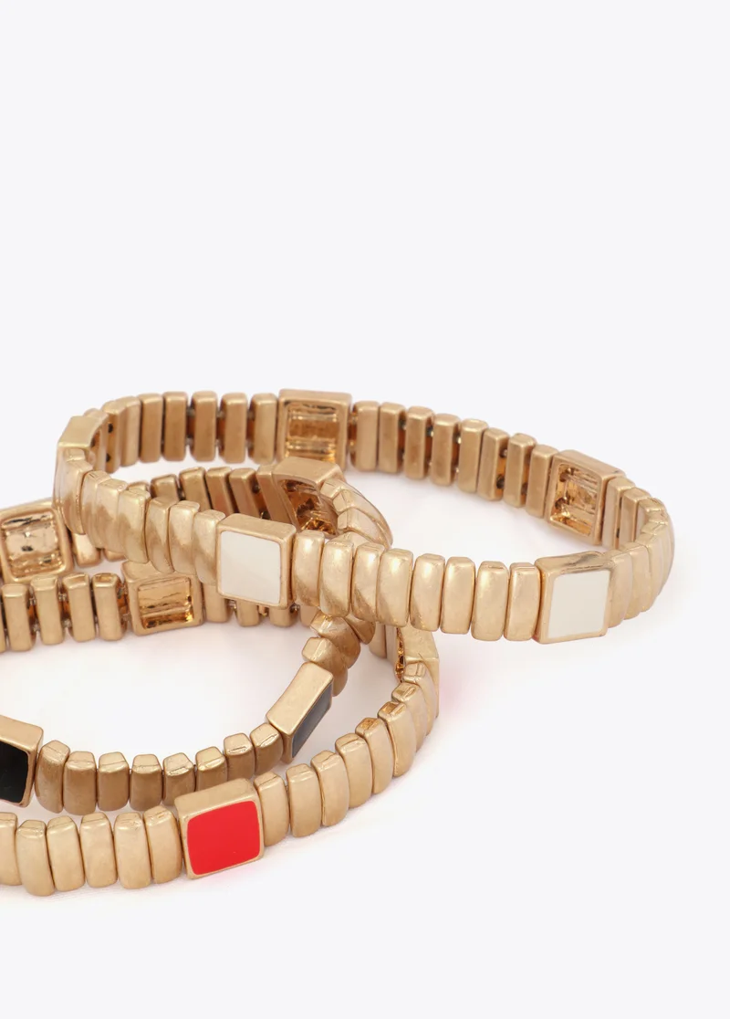 لولا كساديمونت Set of Metallic Elastic Bracelets with Colorful Details