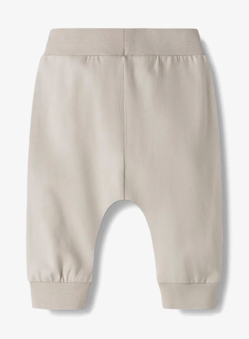 نيم ات سروال رياضي للأطفال بطبعة ورباط شداد