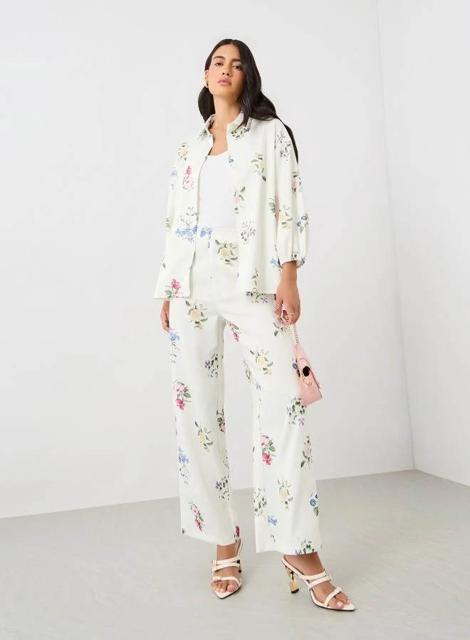 ستايلي بلوزة ستايلي بأكمام بالون وطبعة زهور وأزرار