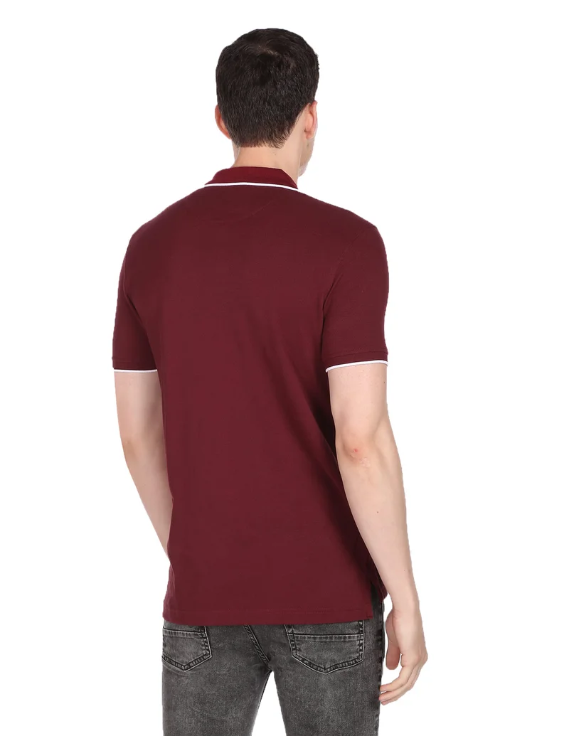 Arrow Burgundy Solid Compact Cotton Polo Shirt for Men | Best Price UAE