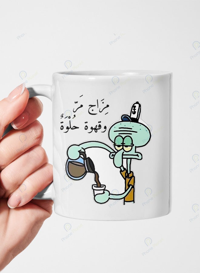 A ceramic mug printed with the phrase Bitter Mood Sweet Coffee and featuring a comfortable handle